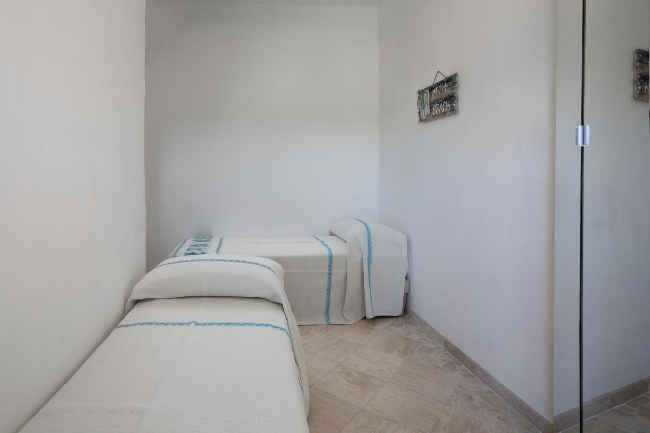 Le Maree Apartments Cannigione Bagian luar foto