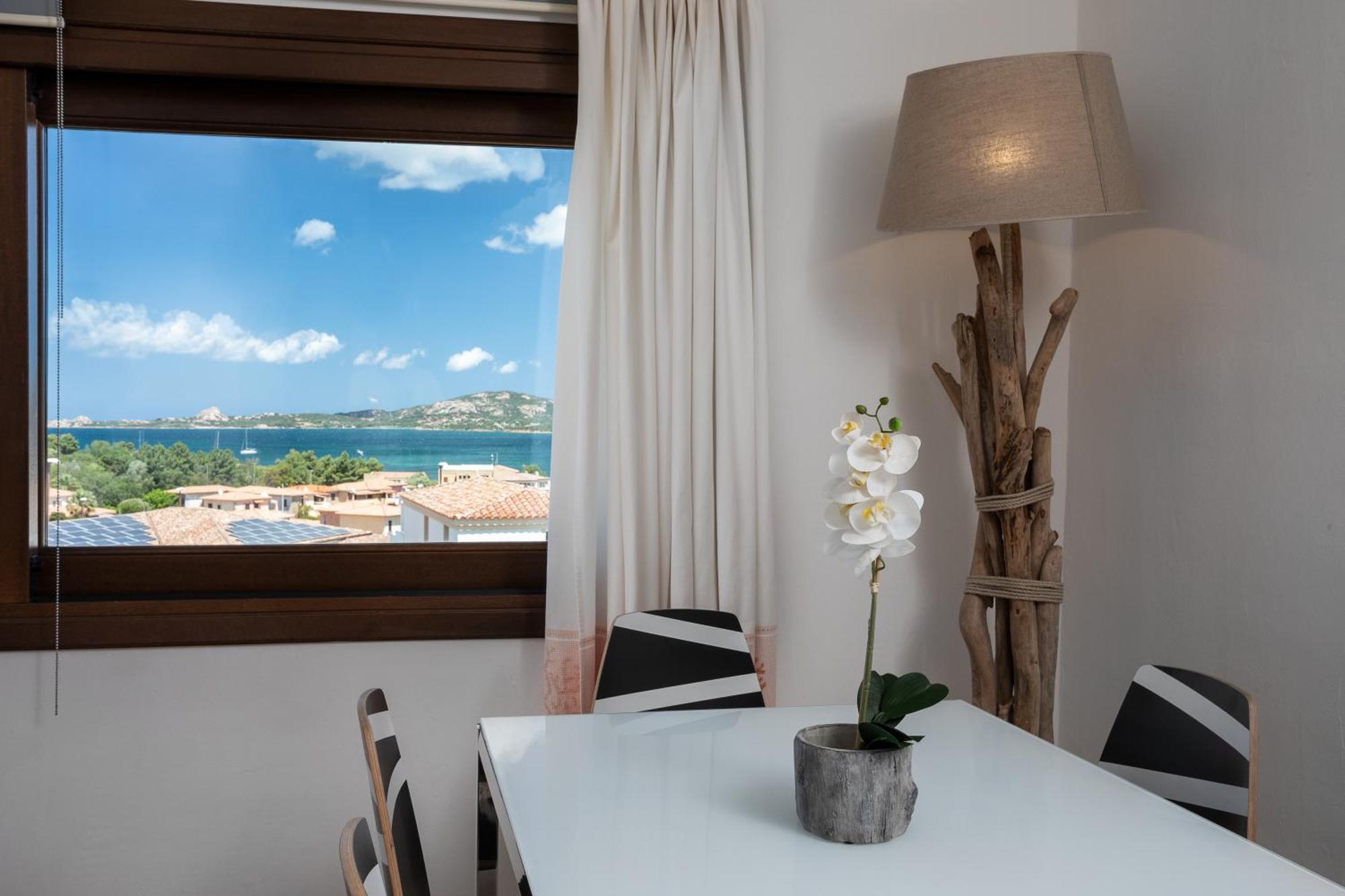 Le Maree Apartments Cannigione Bagian luar foto