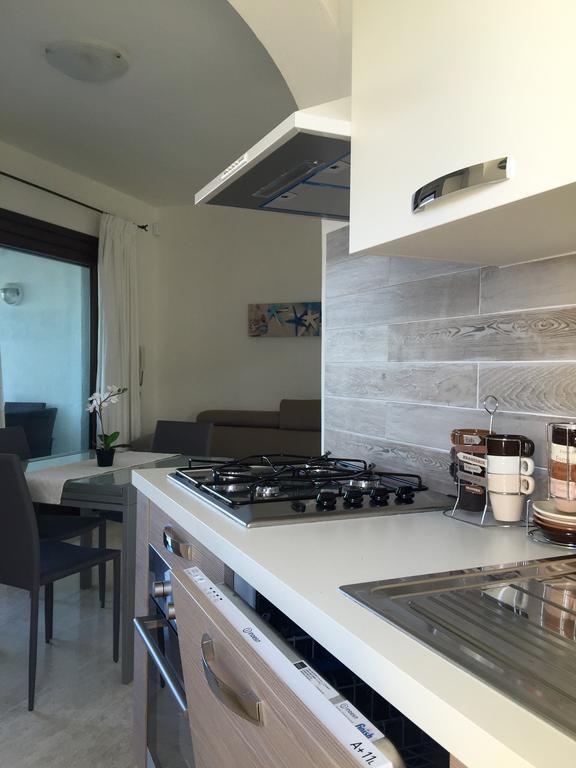 Le Maree Apartments Cannigione Bagian luar foto