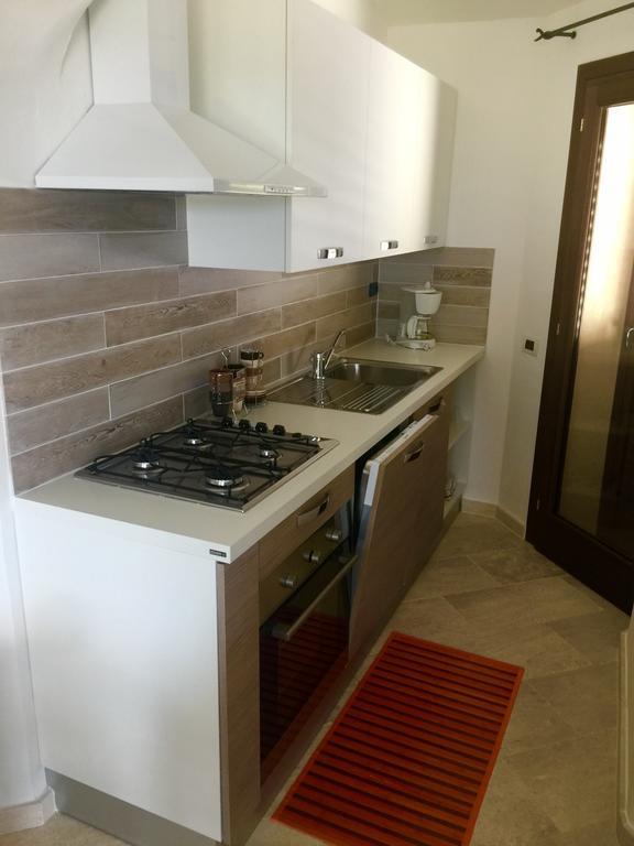 Le Maree Apartments Cannigione Bagian luar foto