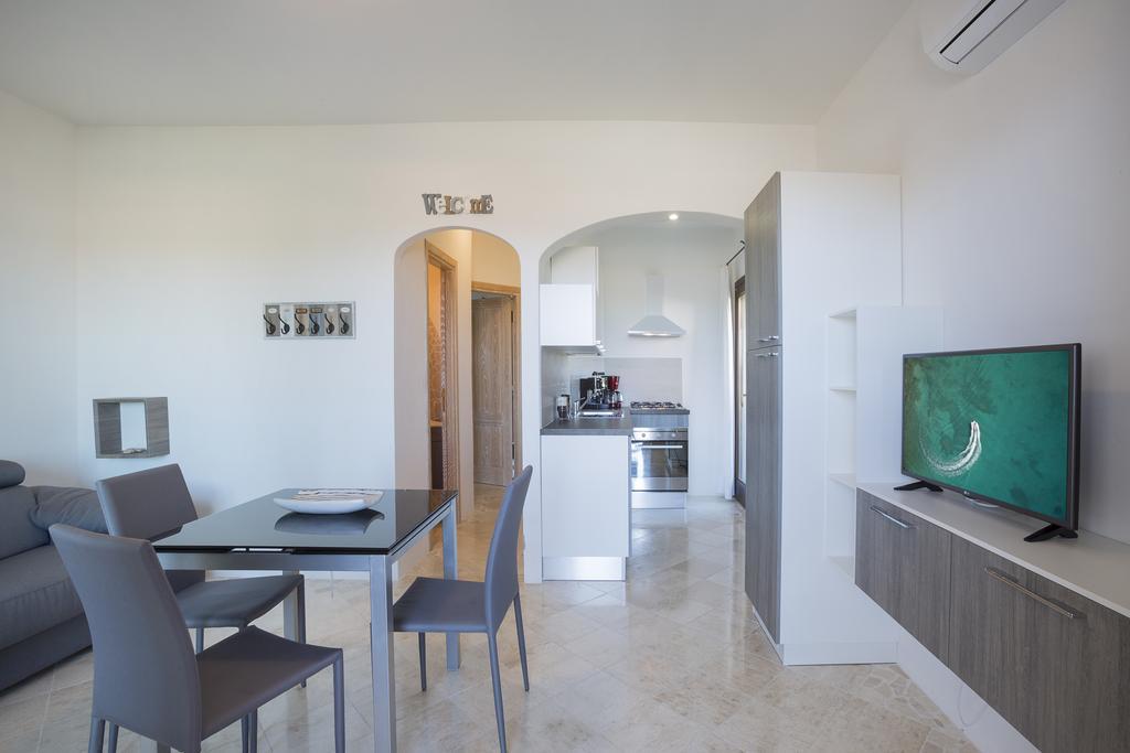 Le Maree Apartments Cannigione Bagian luar foto