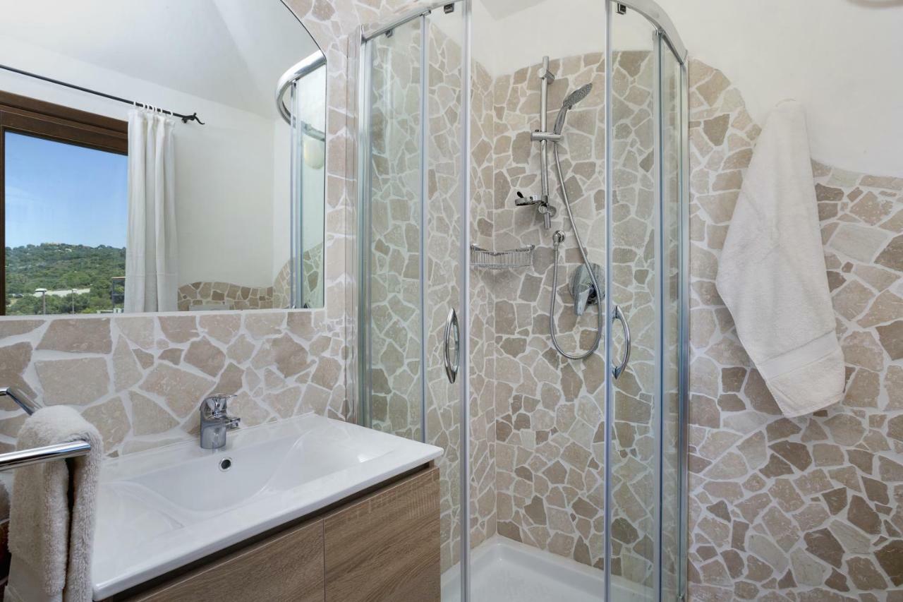 Le Maree Apartments Cannigione Bagian luar foto