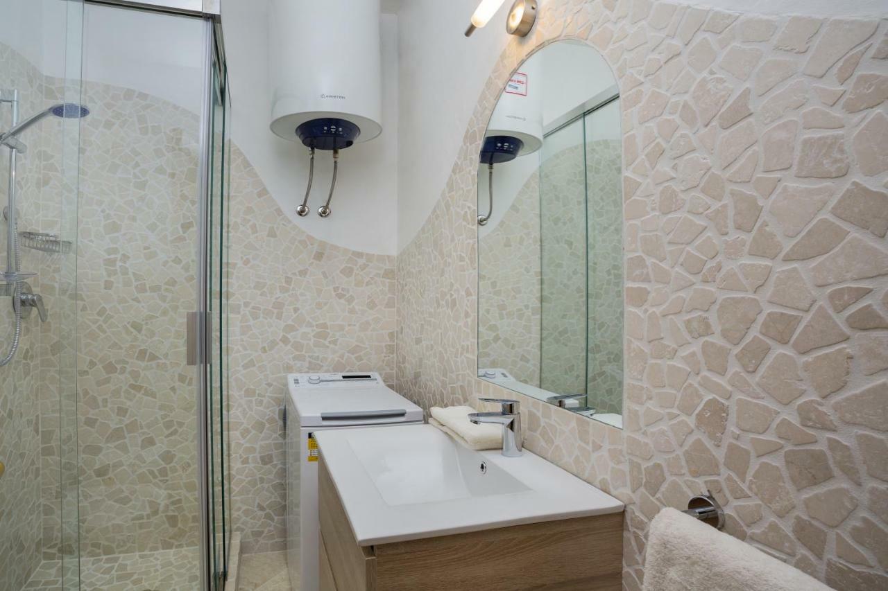 Le Maree Apartments Cannigione Bagian luar foto